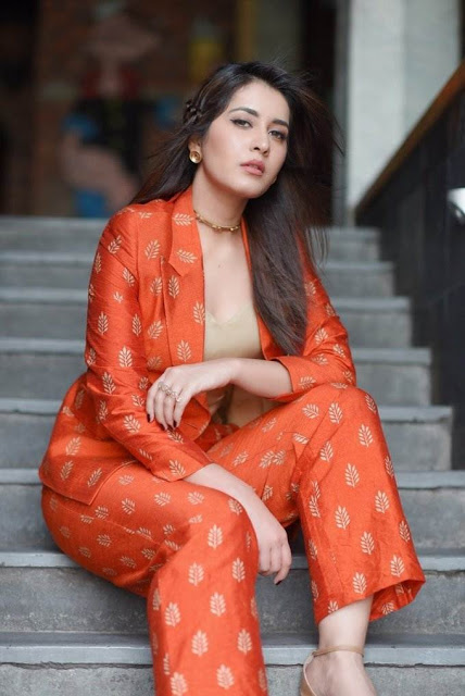 Raashi Khanna latest Photo Shoot In Long Hair Orange Dress 2